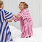 Badrock Poncho Naram Rosa/Röd 5-7 år
